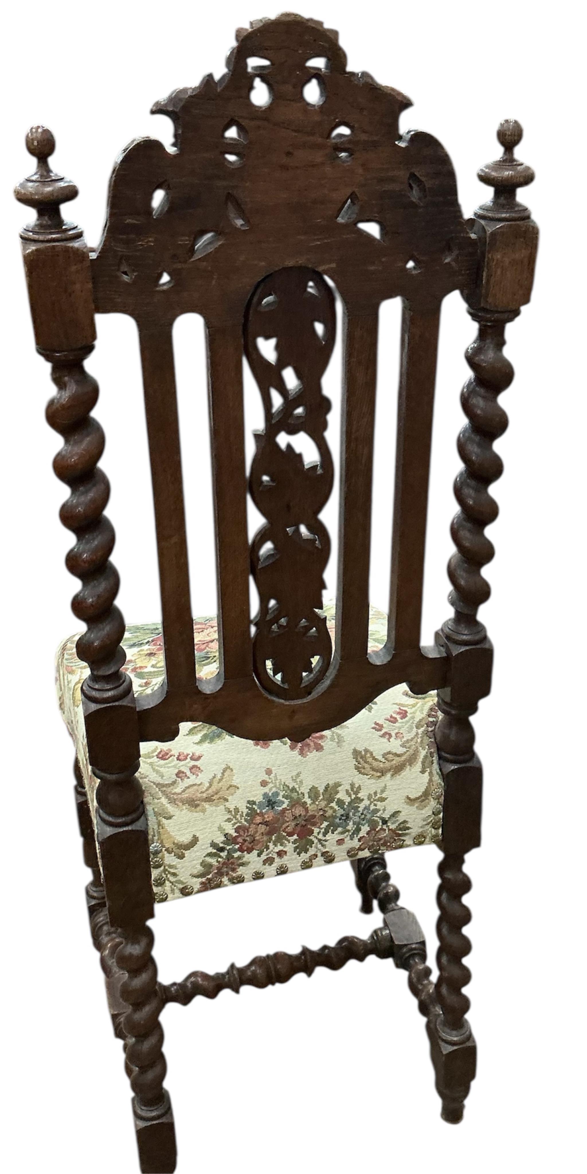 A set of six Victorian carved oak dining chairs, width 38cm, depth 40cm, height 114cm